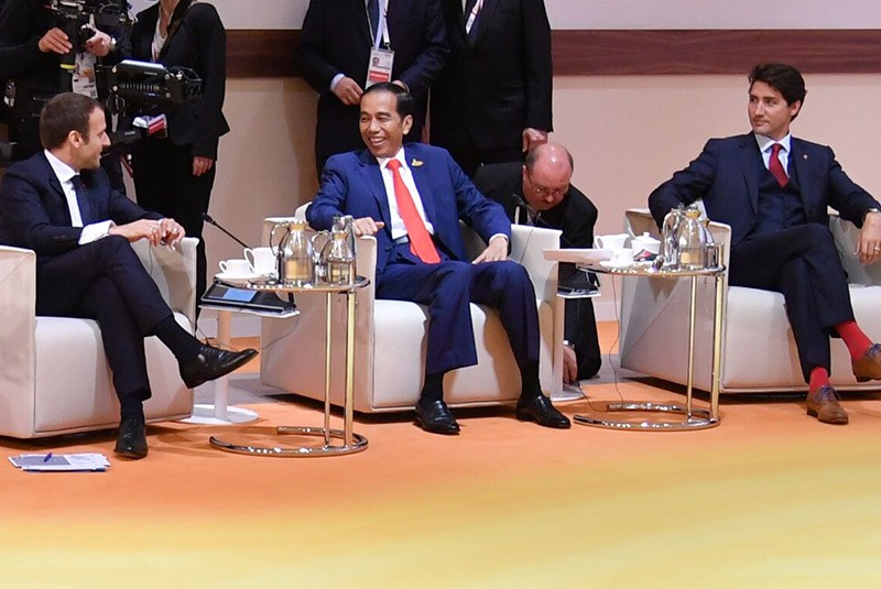 Presiden Joko Widodo bersama Perdana Menteri Kanada Justin Trudeau dan Presiden Prancis Emmanuel Macron di KTT G20 Hamburg. (Foto Biro Pers/Setpres)
