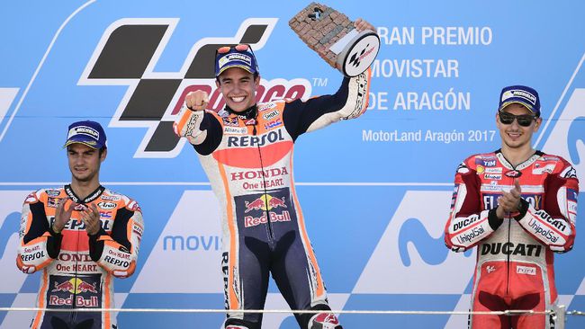 Marquez sukses meraih kemenangan di MotoGP Aragon setelah mengalahkan rekan setimnya, Dani Pedrosa, dan pebalap Ducati Jorge Lorenzo. (foto: AFP)