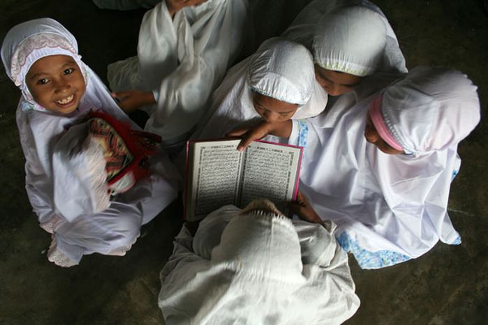 ilustrasi. Orang tua muslim wajib mengajari anak-anaknya ilmu agama