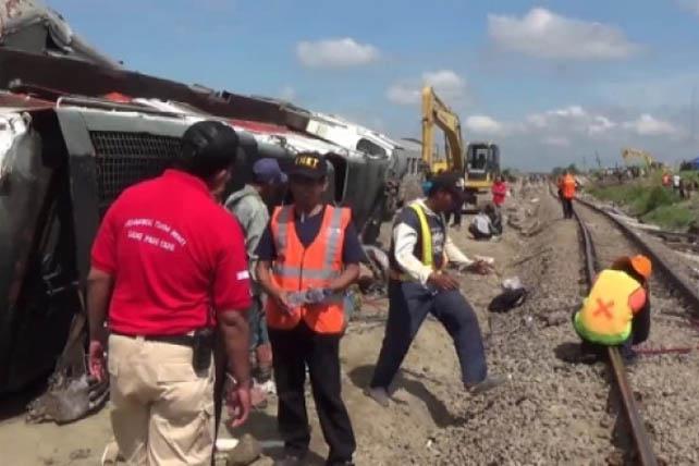Komite Nasional Keselamatan Transportasi (KNKT) lakukan investigasi kecelakaan KA Sancaka dengan truk trailer pengangkut beton bantalan rel. (Foto Istimewa) 