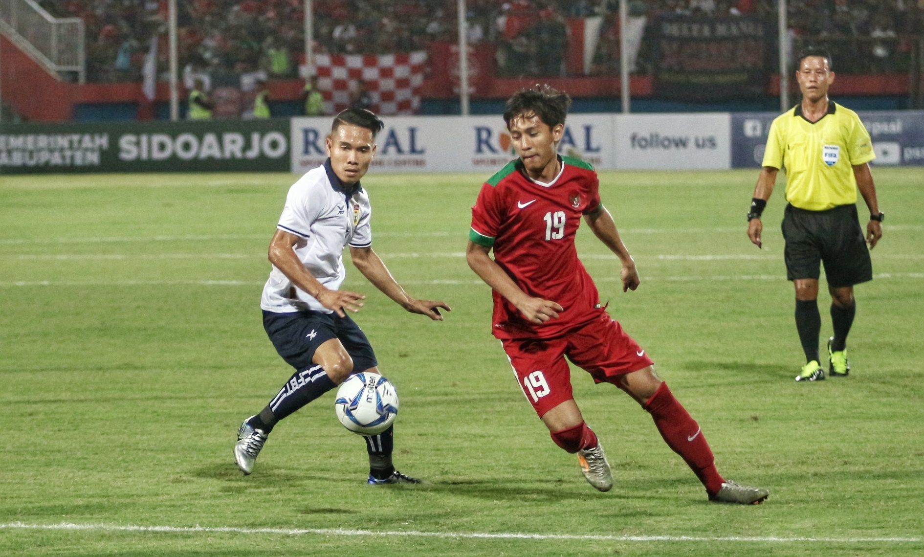 Pemain Timnas Indonesia U-19, Hanis Saghara saat bertanding melawan Laos di Piala AFF, Minggu 1 Juli 2018. (foto: hrs/ngopibareng)
