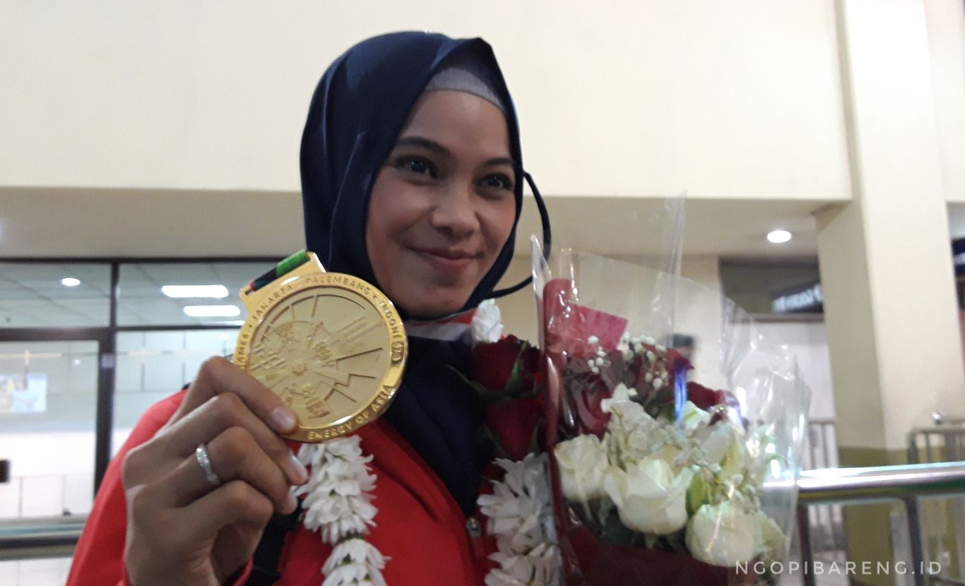 Atlet Jawa Timur, Sarah Tria Monata, peraih emas di Asian Games 2018 cabang olahraga pencak silat. (foto: Haris/ngopibareng)