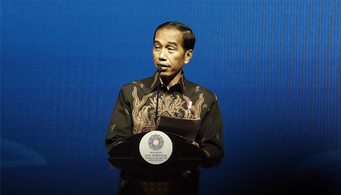 Presiden Joko Widodo saat memberikan sambutan dalam acara The Bali Fintech Agenda IMF–WB 2018 di Nusa Dua, Bali. 