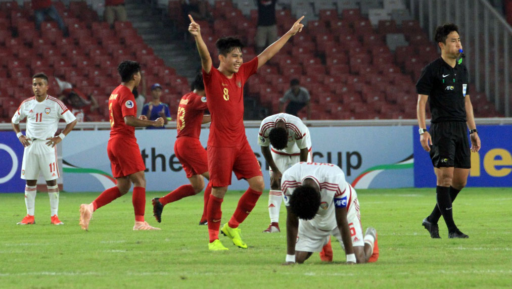 Pencetak gol kemenangan Indonesia U-19 atas Uni Emirat Arab, Witan Sulaeman bersuka cita setelah Tim Garuda Nusantara lolos ke perempat final Piala AFC U-19. (pssi.org)