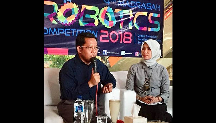Direktur Jenderal Pendidikan Islam Kementerian Agama RI, Kamaruddin Amin saat membuka Kompetisi Robotik Madrasah 2018 di Depok Town Swuare, Senin 5 Nopember 2018. (Foto: Asmanu)