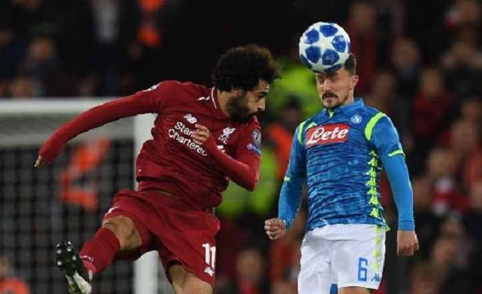 Pemain andalan Liverpool Mohamed Salah mengantar timnya ke babak 16 besar Liga Champions, usai mengalahkan Napoli di Stadion Anfield, Liverpool, Inggris, Rabu pagi WIB.(Foto:AFP)