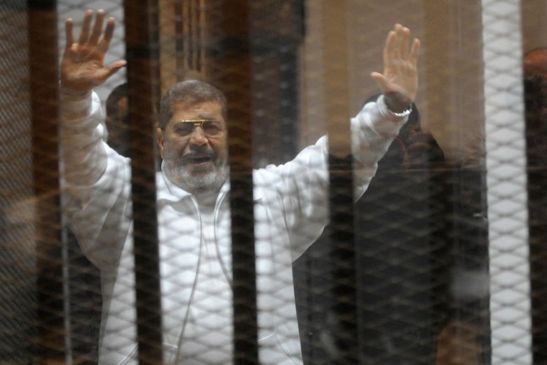 Mohamed Morsi dalam tahanan. (Foto: AFP)