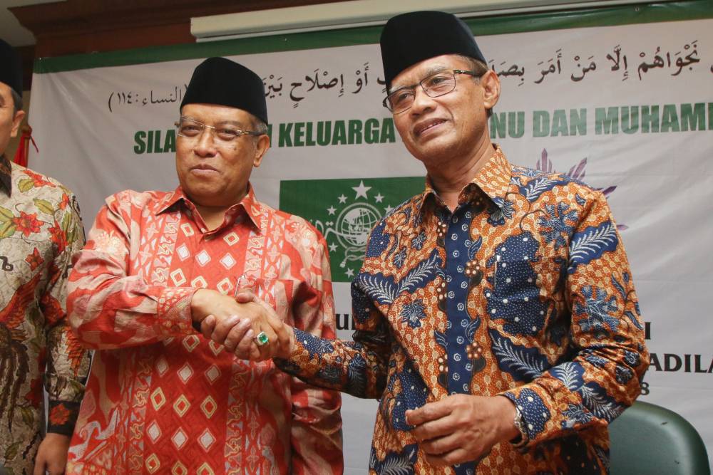 Ketua Umum PBNU KH Said Aqil Siroj, dan Ketua Umum PP Muhammadiyah Haedar Nashir. (foto: dok ngopibareng.id)
