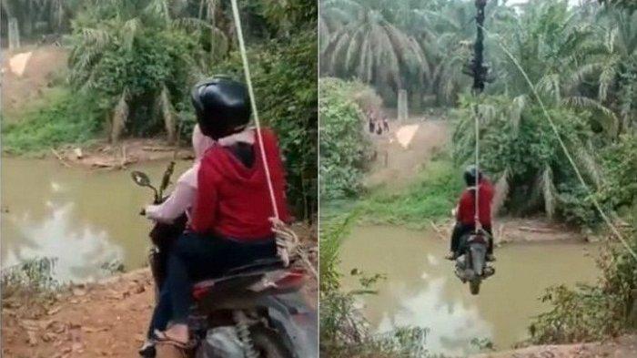 Tangkapan layar dua orang perempuan menaiki sepeda motor menyeberang sungai dengan seutas tali. (Foto: Tangkapan layar)