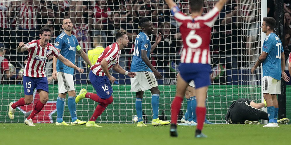 Hector Herrera menyelamatkan Atletico setelah berhasil mencetak gol penyama di injuri time. (Foto: AFP)