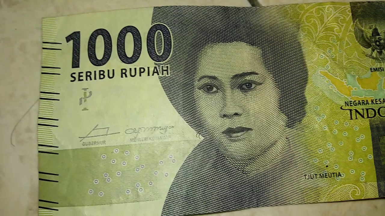 Gambar Pahlawan Nasional Tjut Meutiah dicetak pada bagian depan uang kertas Rp 1.000. (Foto: Istimewa)