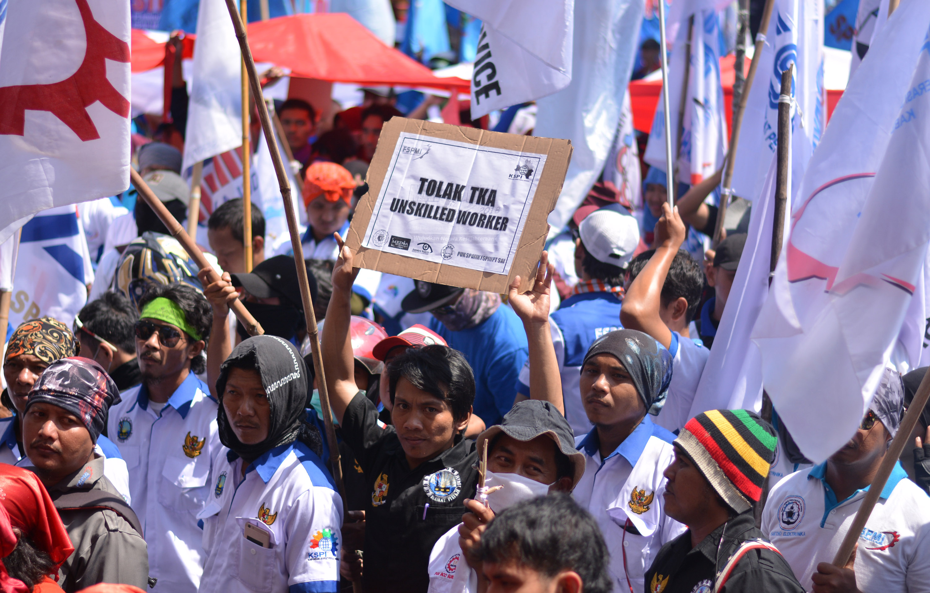 Buruh saat melakukan aksi dalam peringatan Hari Buruh. (Foto: Fariz/ngopibareng.id)