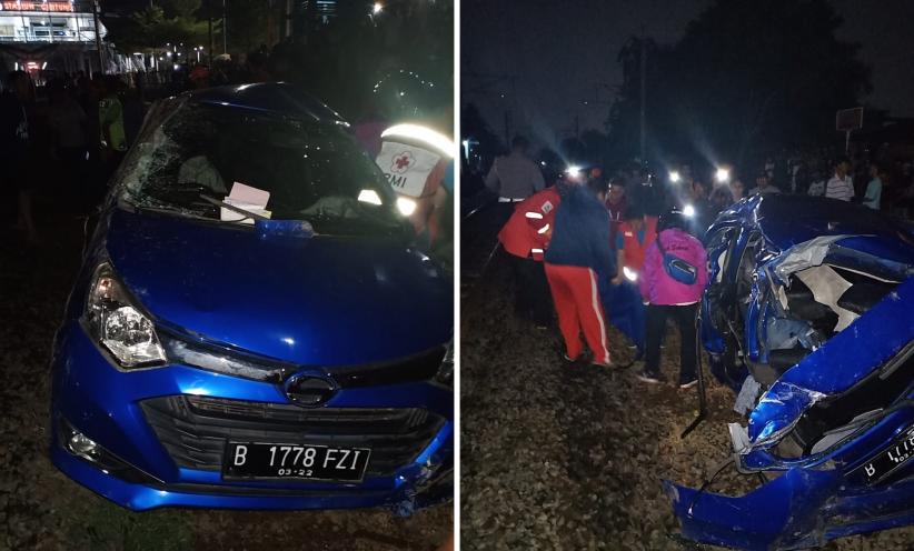 Kondisi mobil ringsek setelah ditabrak kereta jauh Argo Parahyangan jurusan Bandung-Jakarta. Tujuh orang tewas. (Foto: Twitter)