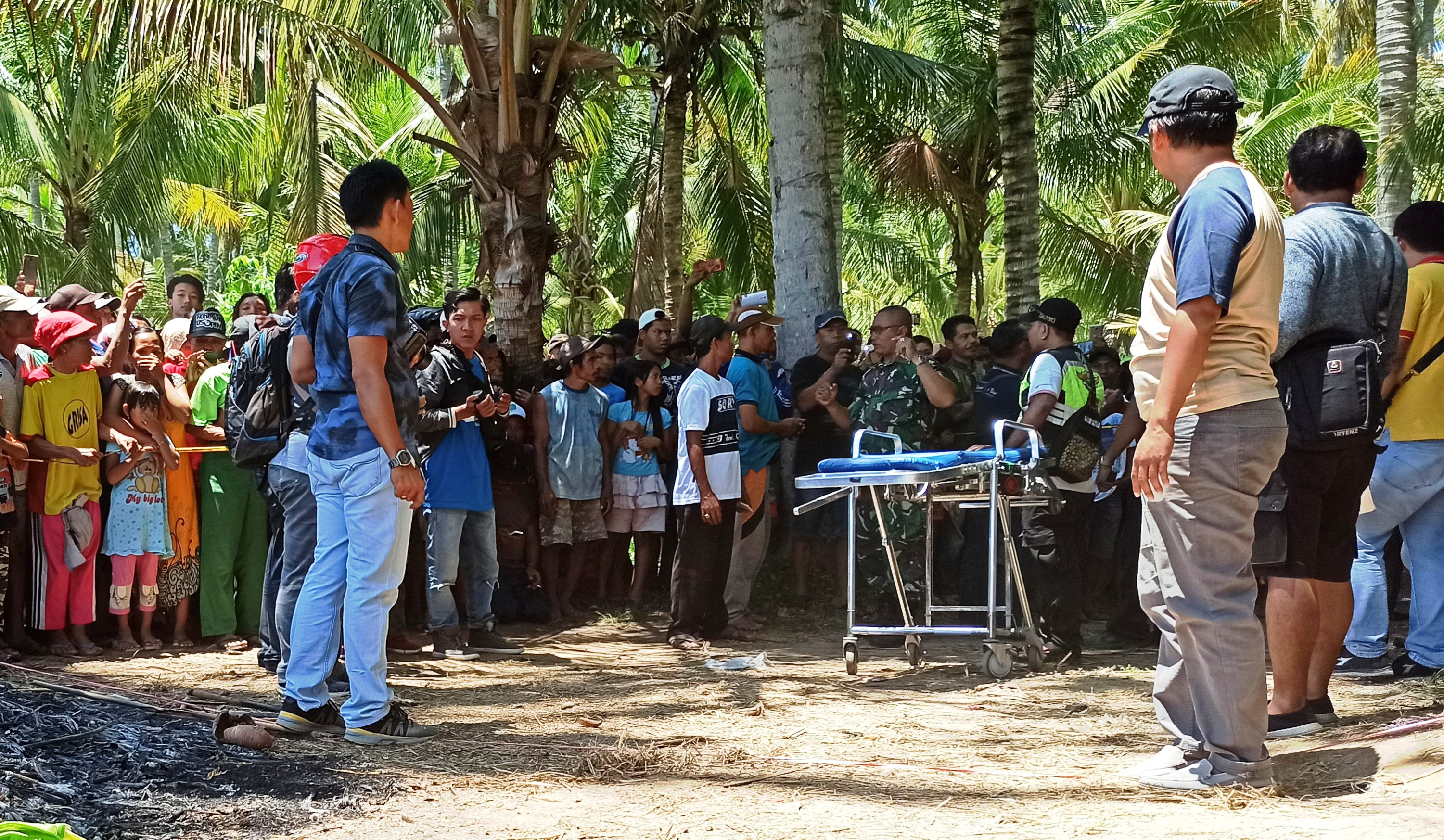 Kebun kelapa tempat penemuan mayat perempuan terbakar, Dusun Kedawung, Desa Pondoknongko, Kecamatan Kabat, Banyuwangi, Sabtu 25 Januari 2020. (Foto: Hujaini/ngopibareng.id)