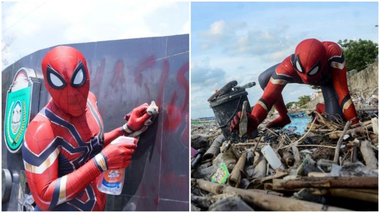 Aksi sosial Rudi Hartono mengenakan kostum Spiderman saat membersihkan sampah. (Foto: Reuters)