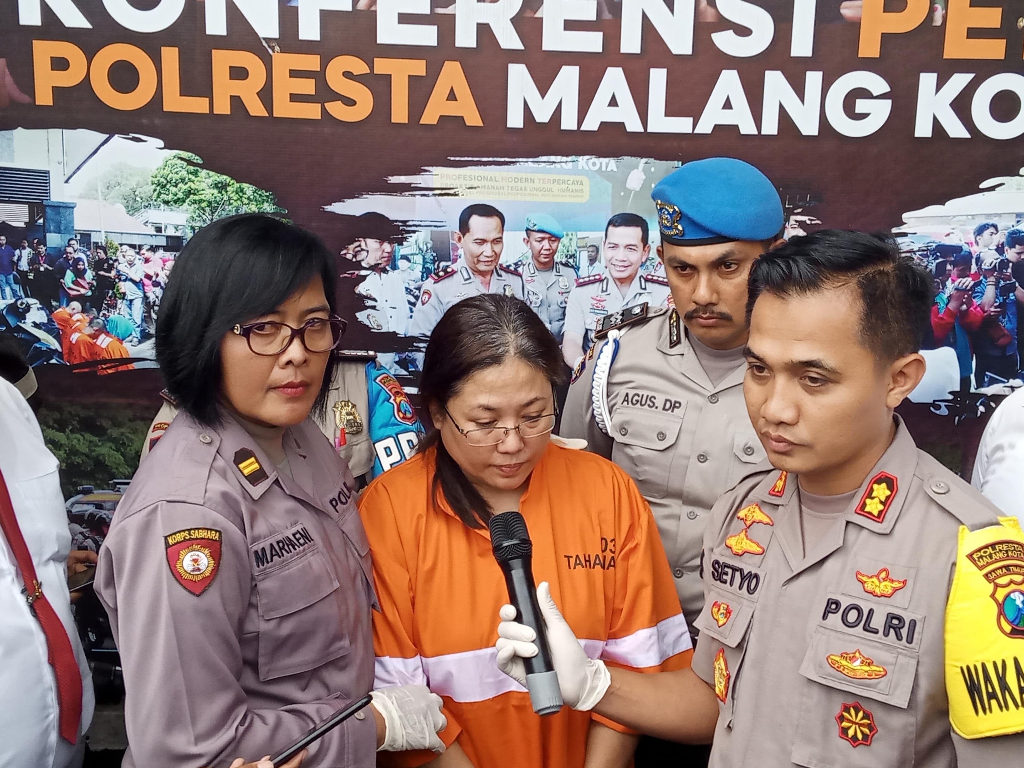 Tersangka LY saat rilis kasus di Mapolresta Malang Kota (Foto: Lalu Theo/ngopibareng.id)
