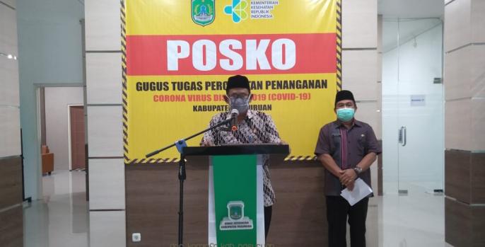 Juru Bicara Gugus Tugas Percepatan Penanganan Covid-19 Kabupaten Pasuruan, Anang Saiful Wijaya dalam konferensi pers, Jumat, 24 April 2020. (Foto: Dok Humas)