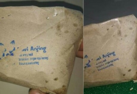Kemasan 'Nasi Anjing' yang dibagikan kepada warga Warakas Tanjung Priok Jakarta Utara. (Foto: Dokumentasi Warga)