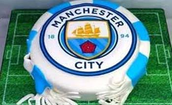 Kue tart untuk Manchester City. (Foto:Reuters)