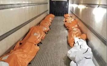 Jenazah-jenazah korban Covid-19 terpaksa disimpan di dalam truk berpendingin di wilayah Hidalgo, Texas, AS. (Foto:Reuters)