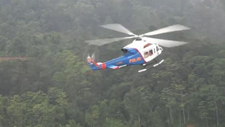 Pencarian Helikopter PT NUH. Helikopter yang membawa sembako ditemukan mendarat darurat di Paniai. (Foto: Ant)