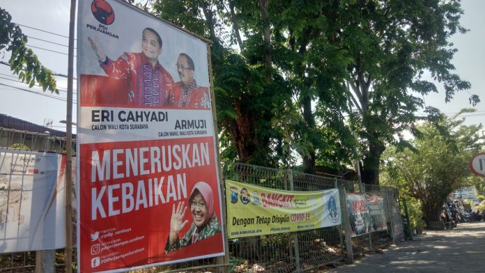 Foto Tri Rismaharini yang bersanding dengan Eri Cahyadi-Armuji dalam Alat Peraga Kampanye Pilkada Surabaya. (Foto: PDI Perjuangan)