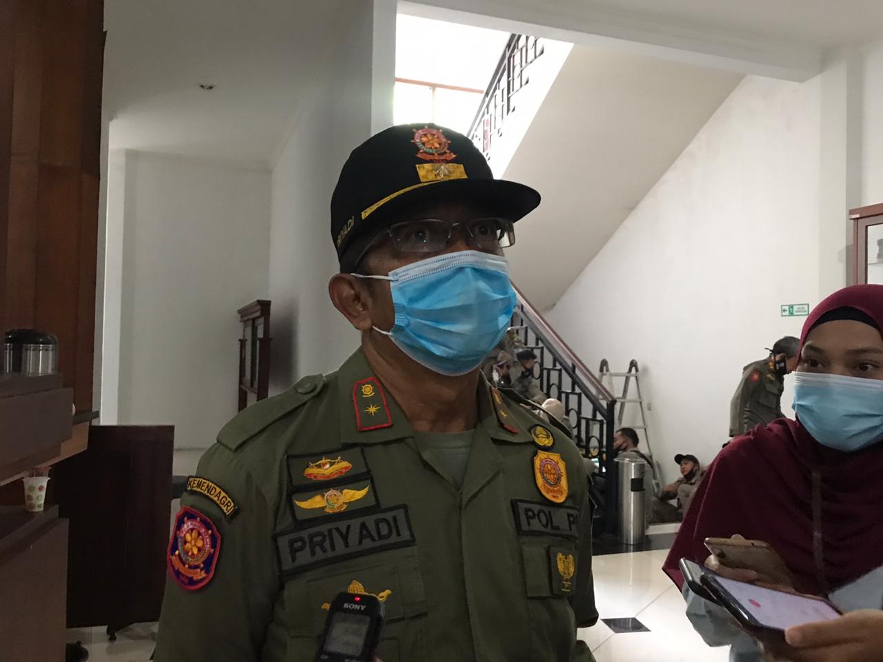 Kepala Satpol PP Kota Malang, Priyadi, saat ditemui di Gedung DPRD Kota Malang (Foto: Lalu Theo/ngopibareng.id)