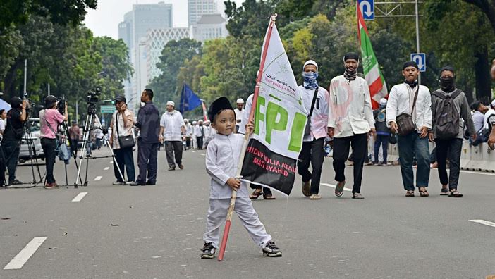 Seorang anak dalam aksi bela Islam. (Foto: Istimewa)