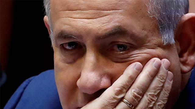 PM Netanyahu menghadapi tuduhan korupsi, sekaligus terancam terdepak karena bergabungnya dua partai oposisi. (Foto:Reuters)