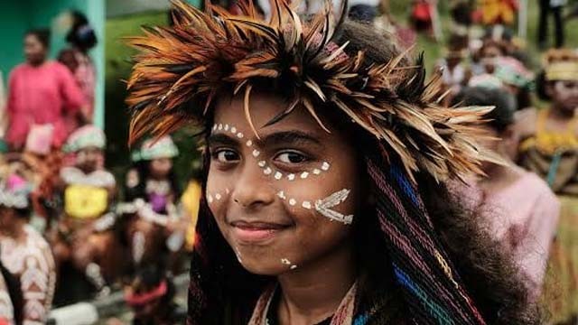 Ilustrasi tulisan UU Otsus Papua vs Cara Pandang terhadap Papua. Gadis Papua. (Foto:Istimewa)