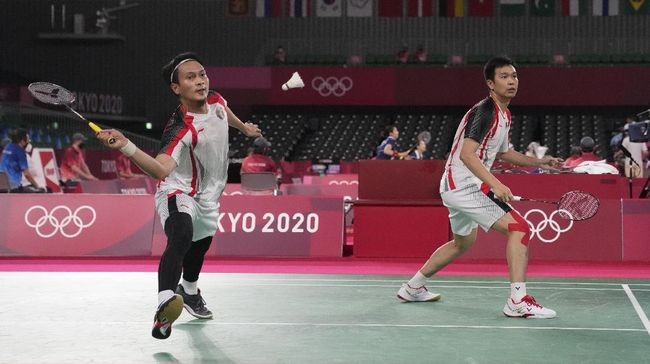 Ahsan/Hendra melaju ke babak semifinal Olimpiade Tokyo 2020 setelah kalahkan tuan rumah, Takeshi Kamura/Keigo Sonoda 21-14, 16-21, 21-9. (Foto: BWF)