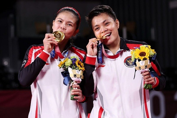 Pasangan ganda putri Greysia Polii/Apriyani Rahayu meraih emas cabang olahraga (cabor) badminton Olimpiade Tokyo 2020, mengalahkan Chen Qing Chen/Jia Yi Fan dari China. (Foto: Istimewa)