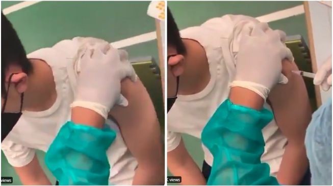 Tangkapan layar video viral tenaga kesehatan (nakes) EO menyuntikkan vaksin kosong ke salah satu warga di Pluit, Jakarta Utara. (Foto: Istimewa)