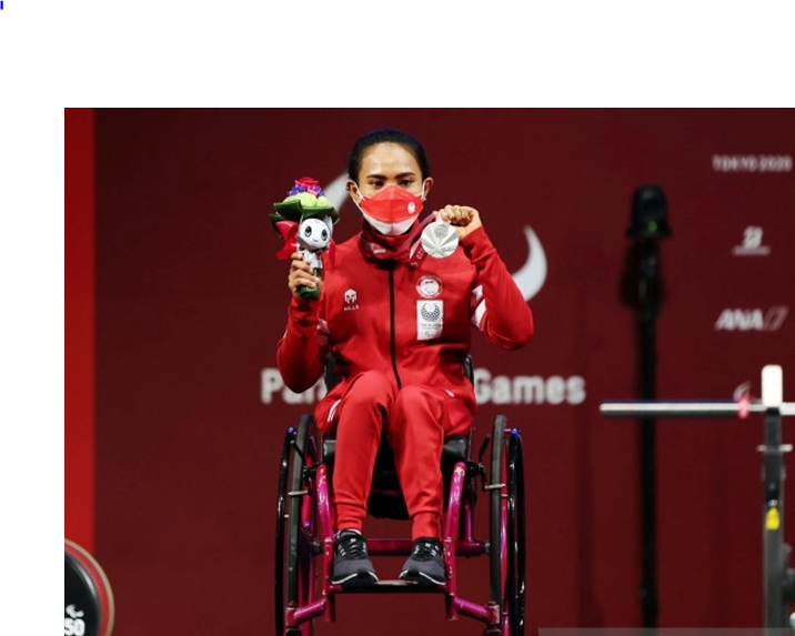 Ni Nengah Widiasih, atlet parapowerlifting atau angkat berat, sumbang medali perak pertama buat Indonesia, Kamis 26 Agustus 2021. (Foto: Istimewa)