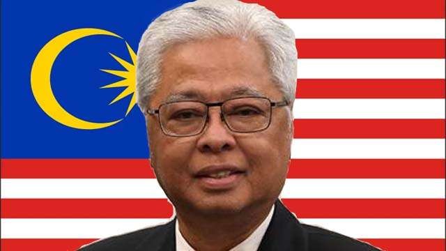 PM Malaysia Ismail Sabri Yaakob harus dikarantina setelah kontak pasien Covid-19. Dia tidak dapat menghadiri upacara pelantikan kabinet, hari ini. (Foto:AP/Ngopibareng)