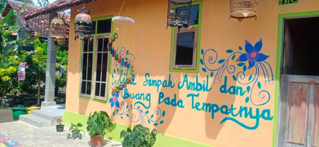 Dinding rumah warga yang dihias dalam rangka Lomba Kelurahan Berseri Kota Pasuruan. (Foto: Istimewa)