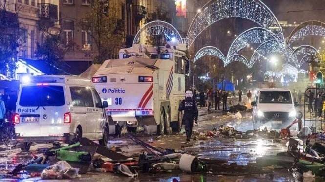 Kondisi Brussels, Ibu Kota Belgia, porak poranda akibat aksi suporter. (Foto: Twitter)
