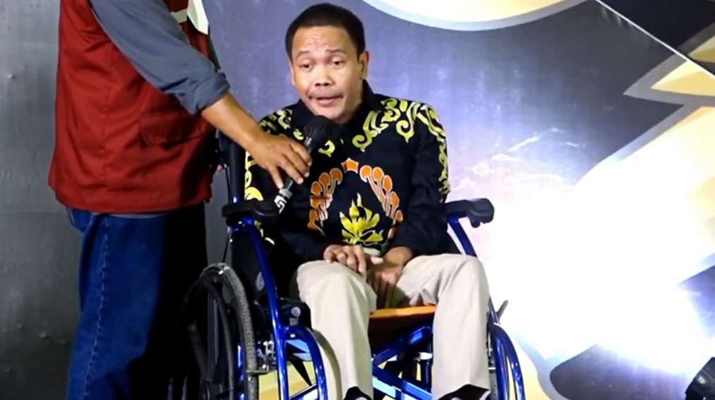 Aktivis difabel Jember, Kusbandono saat memberikan sambutan dalam peringatan Hari Disabilitas Internasional tahun 2022 (Foto: Rusdi/Ngopibareng.id)