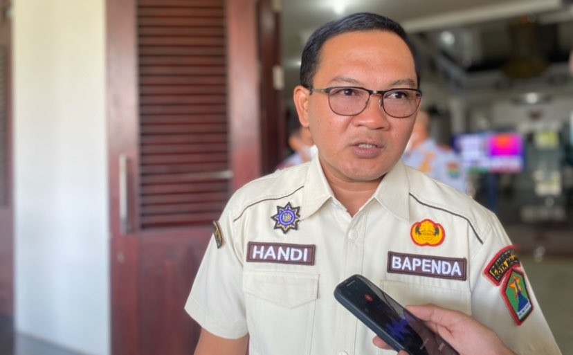 Kepala Bapenda Kota Malang, Handi Priyanto saat ditemui di Gedung DPRD Kota Malang. (Foto: Lalu Theo/Ngopibareng.id)