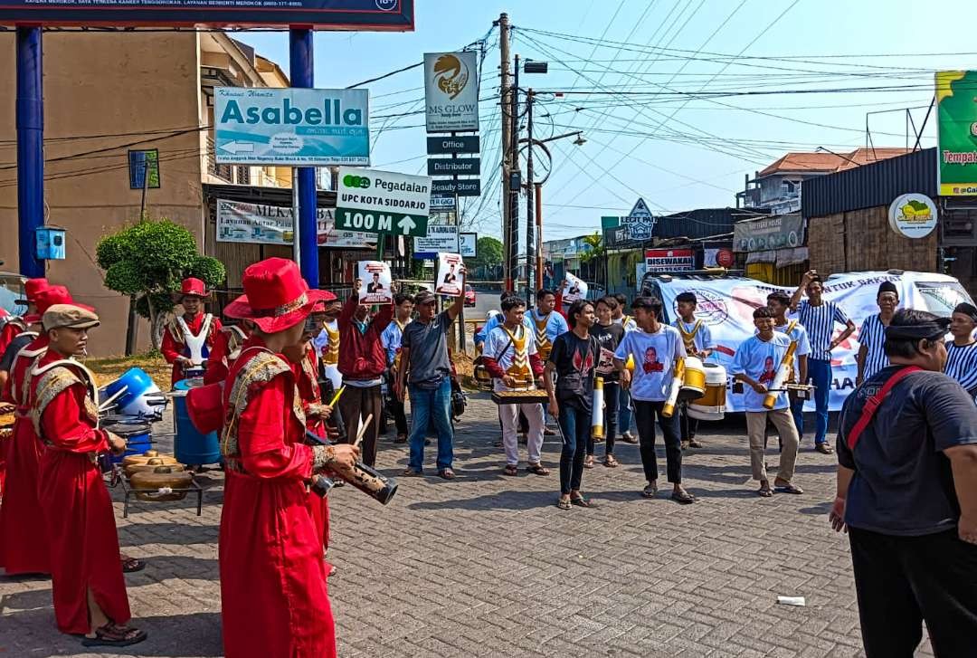 Parade musik patrol relawan Ganjar (Foto : Aini/Ngopibareng.id)