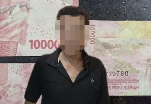 US, pensiunan PNS asal Kota Probolinggo tertangkap usai mengedarkan uang palsu di Jember (Foto: Dok Polsek Rambipuji)