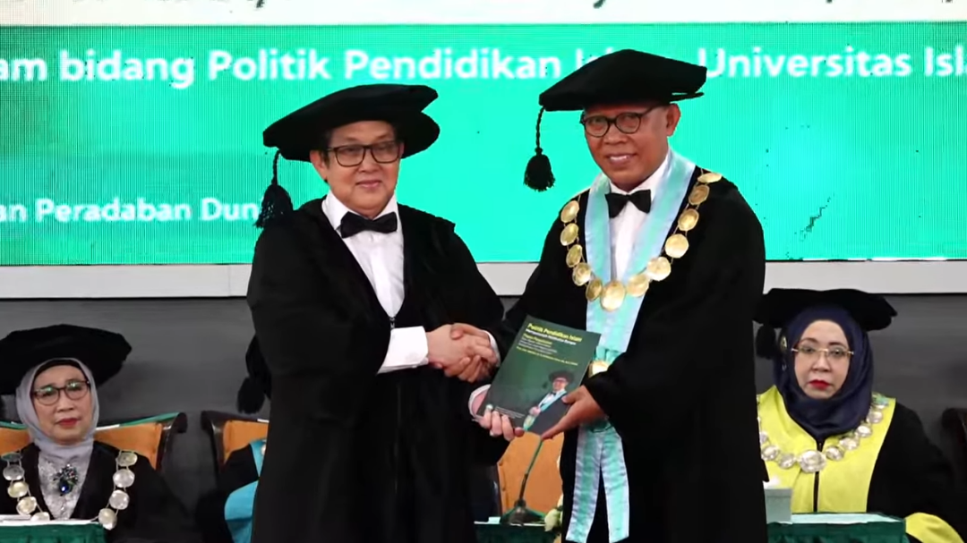 Prof (HC) Dr Ali Masykur dan Rektor Universitas Islam Malang, Prof Masykuri. (Foto: hms-unisma)